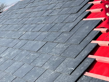 Skilled tile and slate roofers